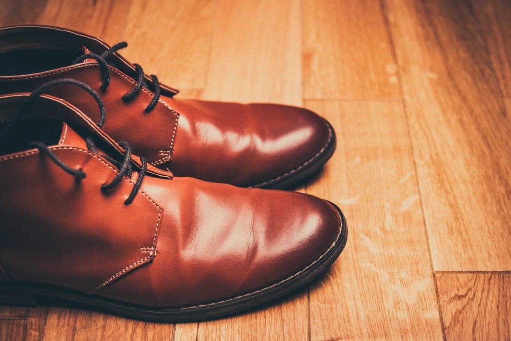 Work boots on a concrete warehouse floor